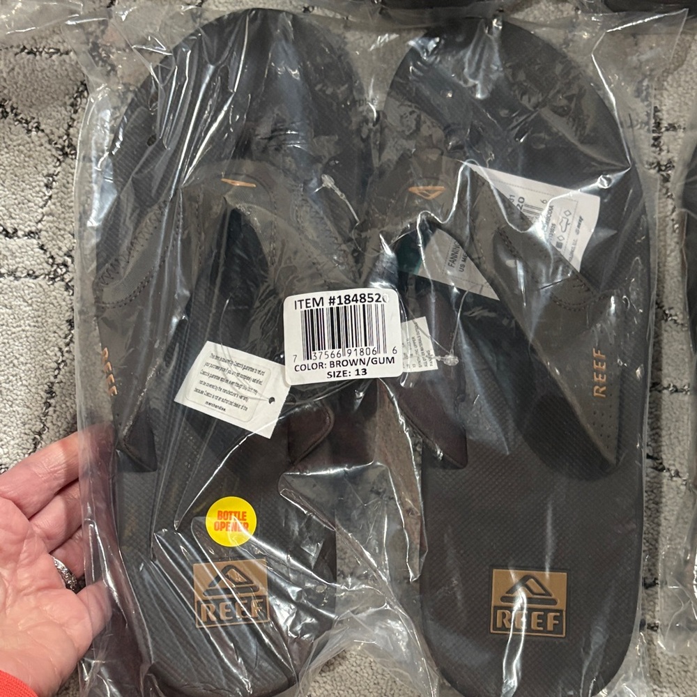 Reef Men's Dark Brown Flip Flops with the bottle
Opener on the bottom!!